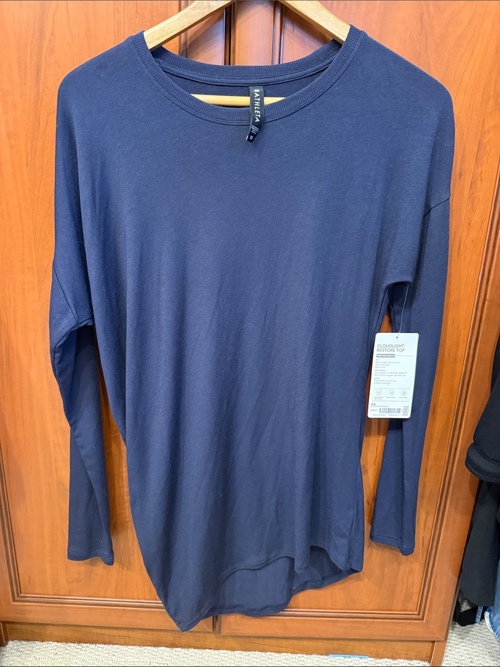 Athleta Womens Navy Long-Sleeve Asymmetrical hem. CloudLight Restore Top